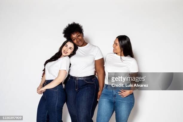 plus size females in casuals - white/black shirt stock-fotos und bilder
