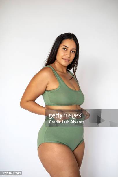 beautiful woman with large body wearing lingerie - bras pull bildbanksfoton och bilder