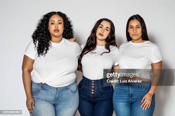 plus size women in casuals on white background - three people white background stock pictures, royalty-free photos & images