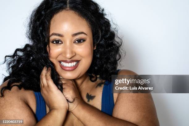 close-up portrait of a plump woman - plus size fashion model stock pictures, royalty-free photos & images