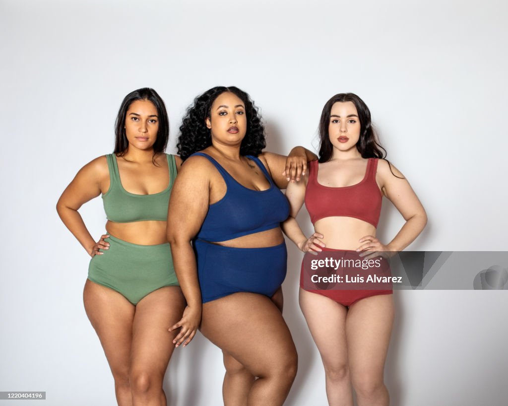 Group of women with different body shapes in lingerie
