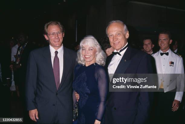 Andrew Aldrin with Lois Driggs Cannon and his father American astronaut Buzz Aldrin at an event, 1994.