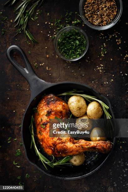 chicken leg in a skillet - drumstick stock pictures, royalty-free photos & images