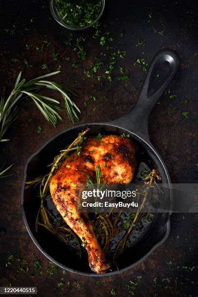 chicken leg in a skillet - crunchy food stock pictures, royalty-free photos & images