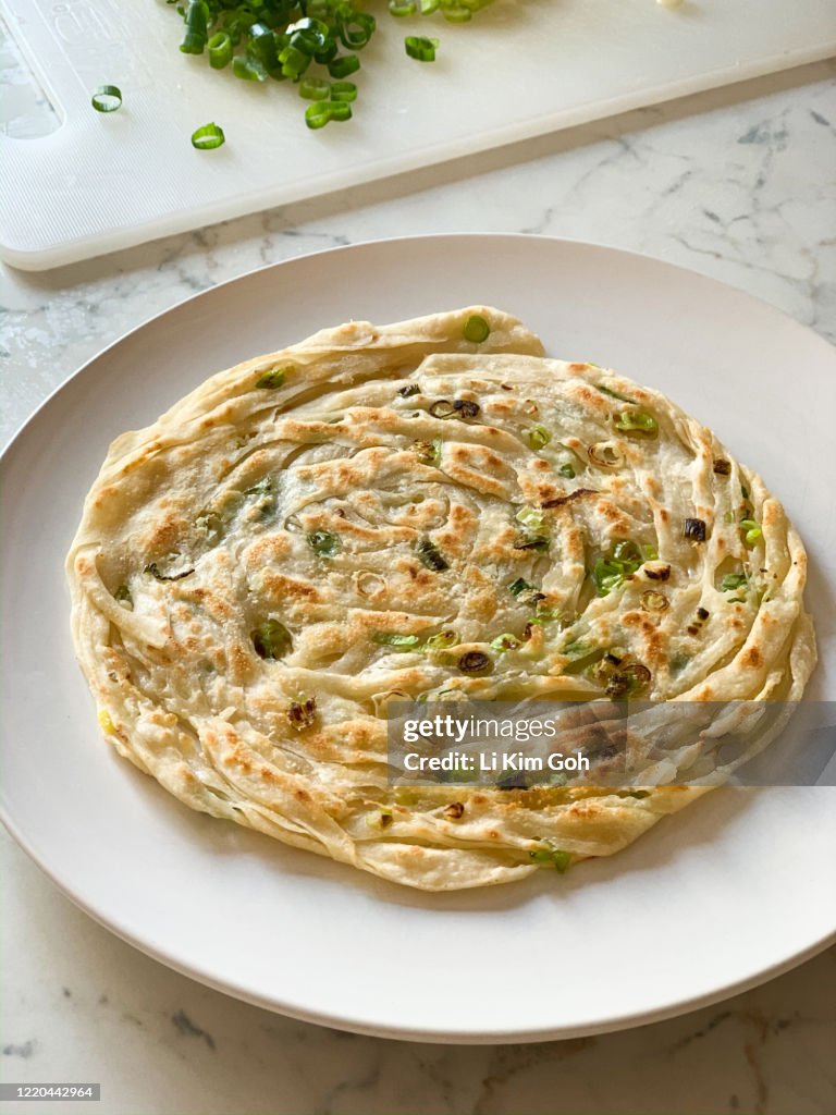 Cong You Bing or Chinese Scallion Pancake, is a famous traditional Chinese street food