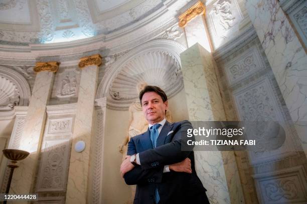 Italy's Prime Minister Giuseppe Conte poses within an interview with AFP at Villa Pamphilj in Rome on June 16 as the country eases its lockdown aimed...