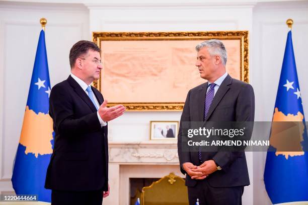 Special Representative for the Pristina-Belgrade Dialogue Miroslav Lajcak and Kosovo's President Hashim Thaci chat following their meeting in...