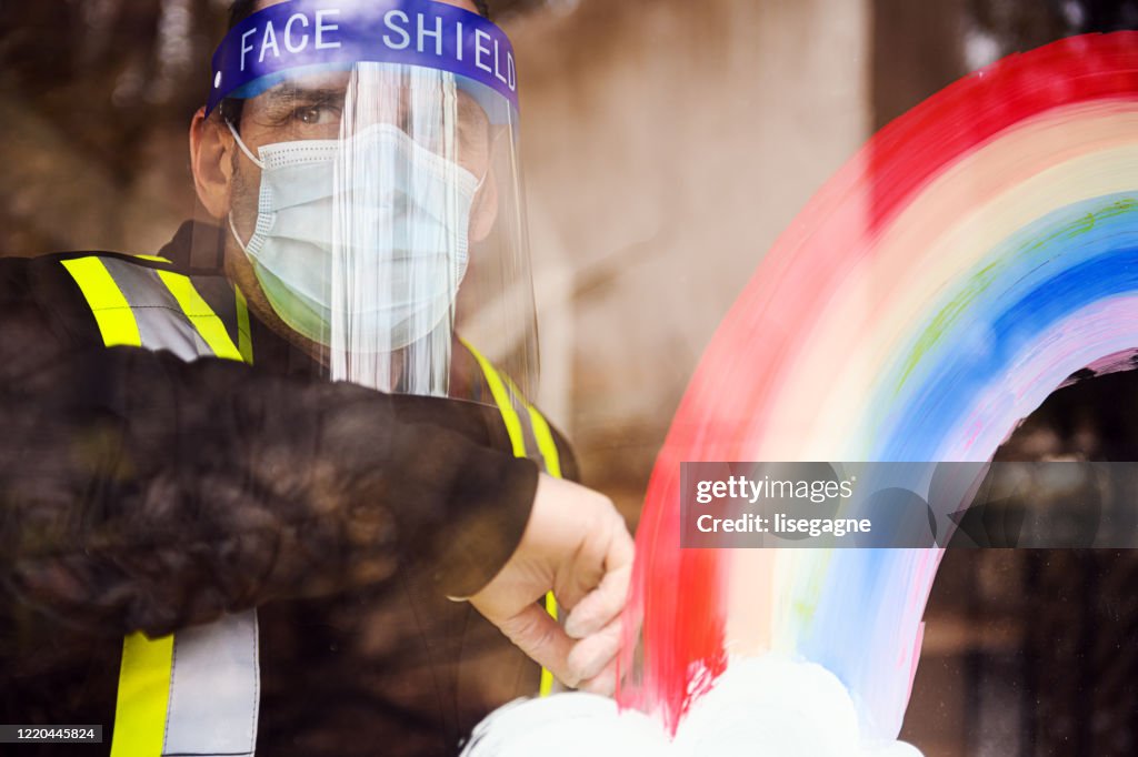 Security staff photographed through window