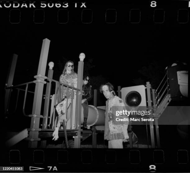 Daisy Berkowitz, Singer Marilyn Manson and Gidget Gein pose for photos on a school playground circa 1990 in Ft. Lauderdale, Florida.