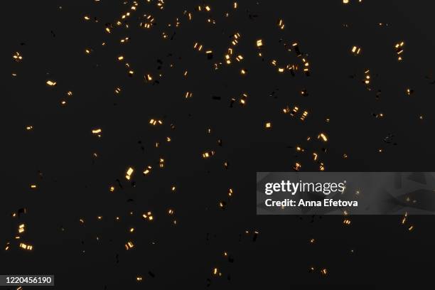 falling golden glowing confetti - confetti gold ストックフォトと画像