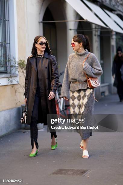 Brittany Xavier and Doina Ciobanu are seen, outside Tod's, during Milan Fashion Week Fall/Winter 2020-2021 on February 21, 2020 in Milan, Italy.