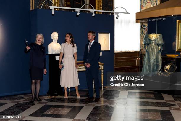 Crown Princess Mary and Crown Prince Frederik of Denmark seen at the exhibition opening of "The Faces of the Queen" celebrating Queen Margrethe II of...