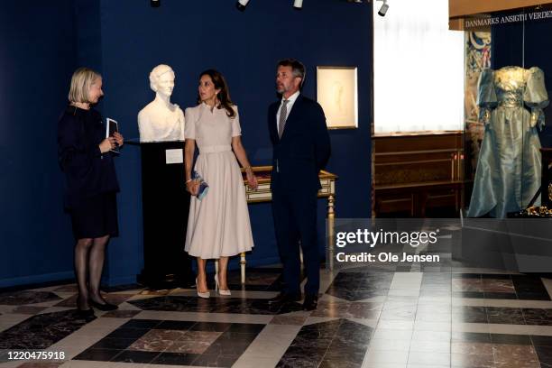 Crown Princess Mary and Crown Prince Frederik of Denmark seen at the exhibition opening of "The Faces of the Queen" celebrating Queen Margrethe II of...