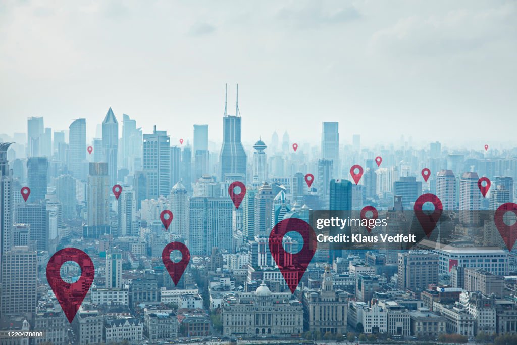 Map pin icons on cityscape of Shanghai