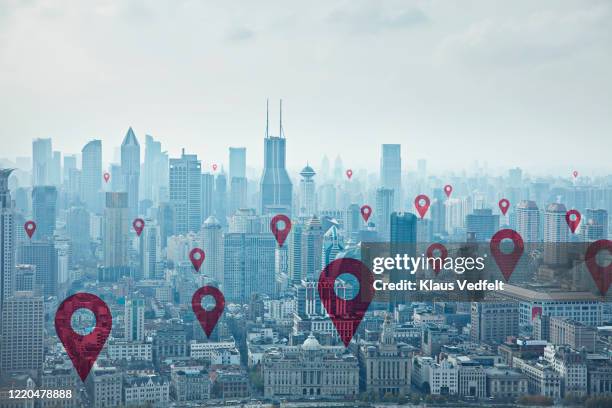 map pin icons on cityscape of shanghai - location pin icon stockfoto's en -beelden