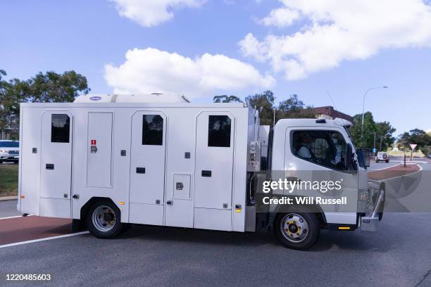 Prison van believed to be transporting former West Coast Eagles AFL player Ben Cousins leaves the Armadale Magistrates Court in Perth on Thursday,...