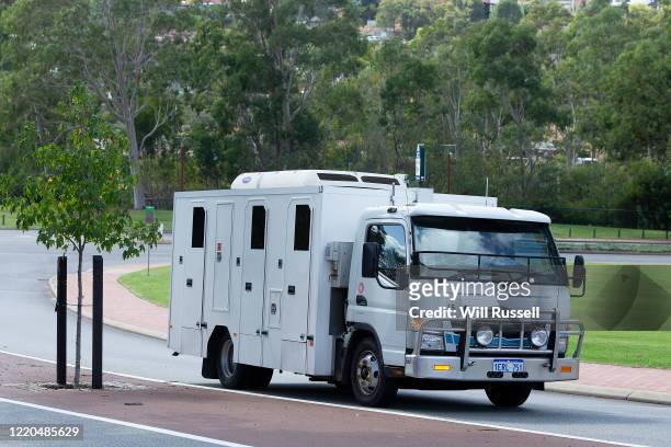 Prison van believed to be transporting former West Coast Eagles AFL player Ben Cousins leaves the Armadale Magistrates Court in Perth on Thursday,...