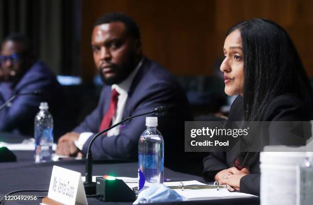 Leadership Conference on Civil & Human Rights President and CEO Vanita Gupta testifies as Doug Logan Jr., president and professor of urban ministry...