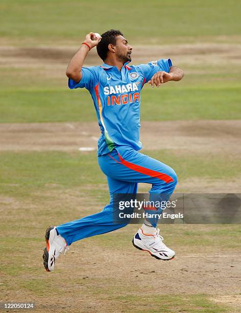 Praveen Kumar of India bowls during the one day tour match between Sussex and India at The County Ground on August 25, 2011 in Hove, England.