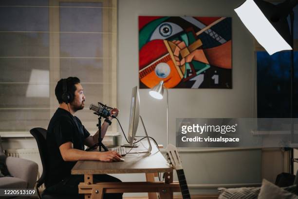 Professional podcaster in his home studio