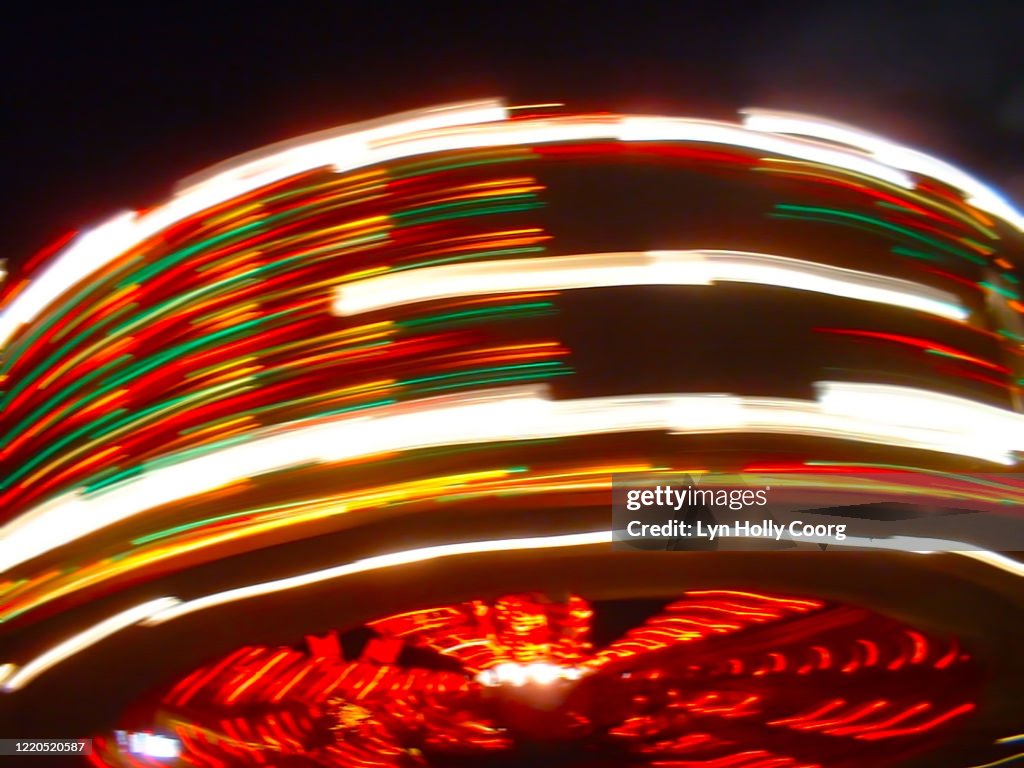 Defocussed fairground ride at speed