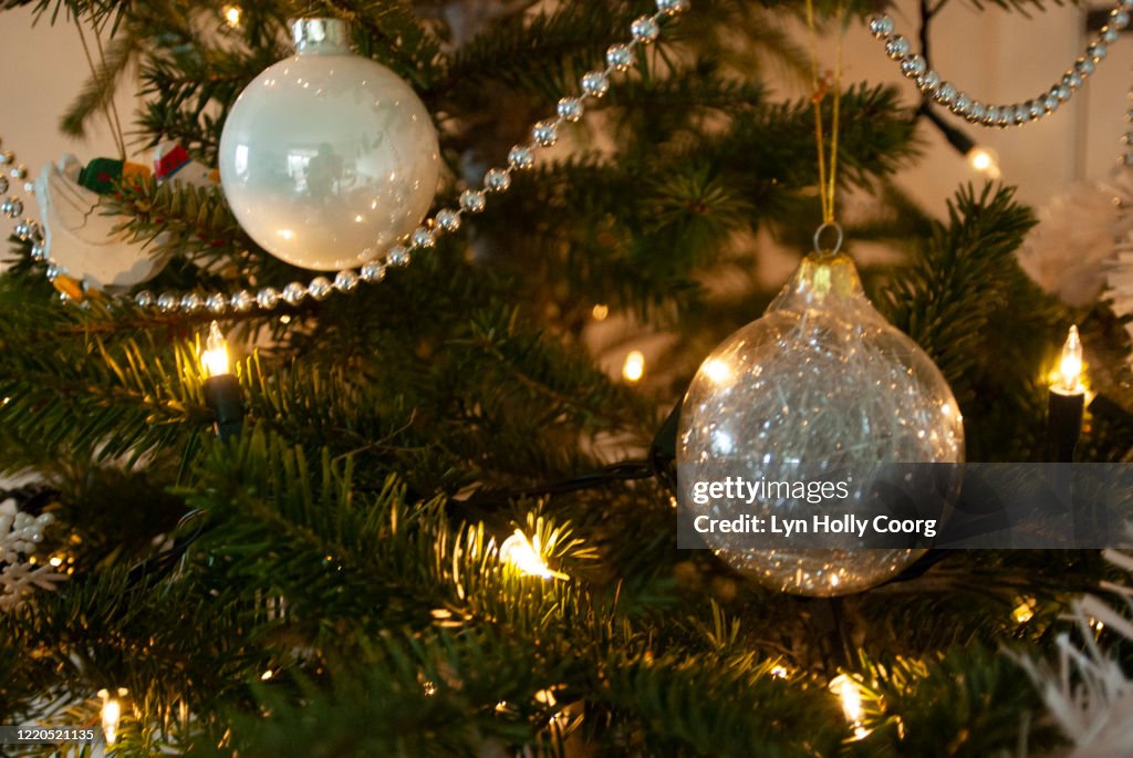 Christmas decorations and garland on Christmas tree