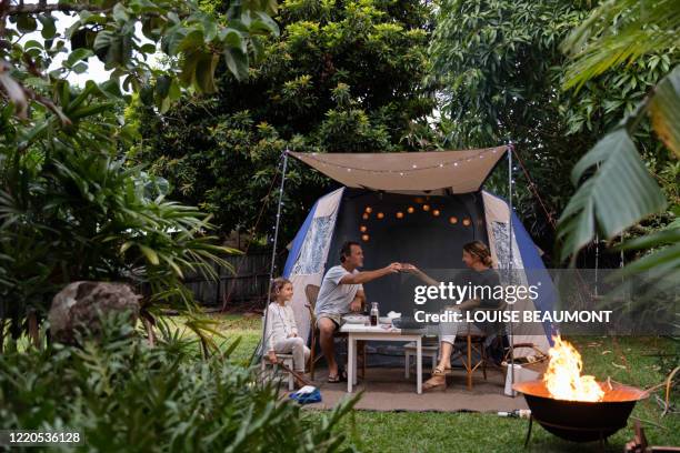 family camping in backyard - back yard stock pictures, royalty-free photos & images