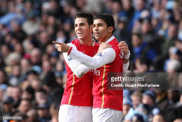 Eduardo celebrates scoring a goal for Arsenal with Cesc Fabregas during the Premier League match between Manchester City and Arsenal on February 2,...