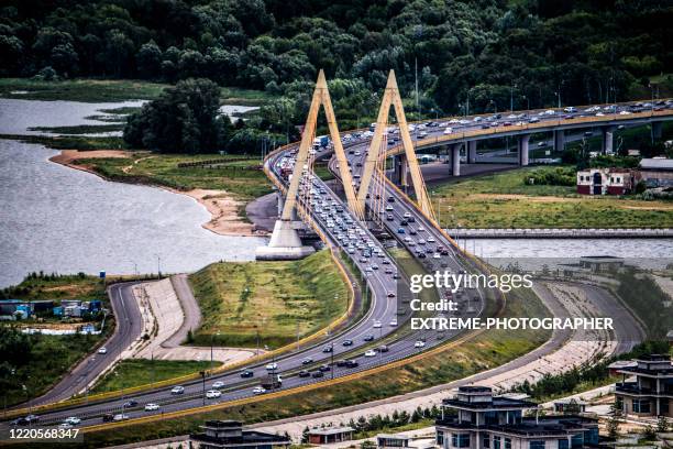 helicopter view on the millennium bridge in kazan capital of republic of tatarstan, russia, taken from the northern side - tatarstan stock pictures, royalty-free photos & images