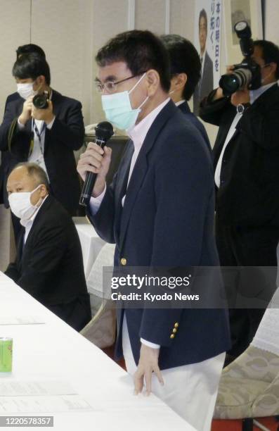 Japanese Defense Minister Taro Kono speaks in Tokyo on June 17 during a meeting on the issues of North Korea's missiles and nuclear tests. Kono also...