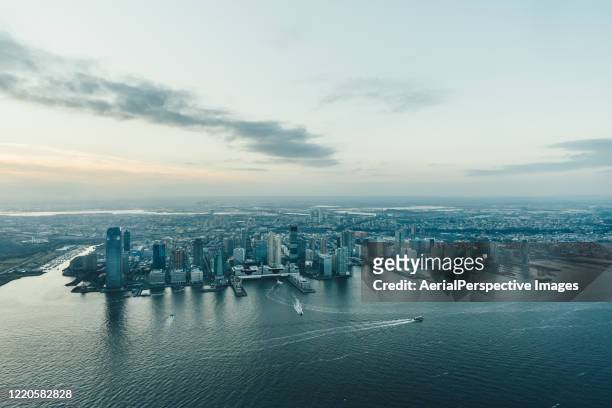 aerial view of jersey city skyline at sunset / new jersey - jersey city fotografías e imágenes de stock