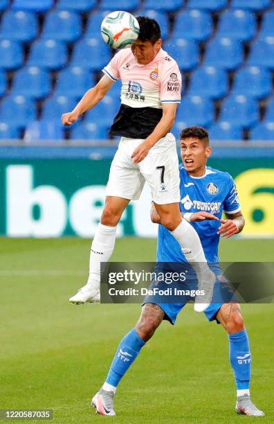 Mathias Olivera of FC Getafe and Wu Lei of Espanyol Barcelona battle for the ball during the Liga match between Getafe CF and RCD Espanyol at...