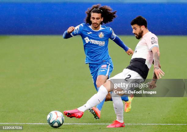 Marc Cucurella of FC Getafe and Pipa Gonzalo Avila of Espanyol Barcelona battle for the ball during the Liga match between Getafe CF and RCD Espanyol...