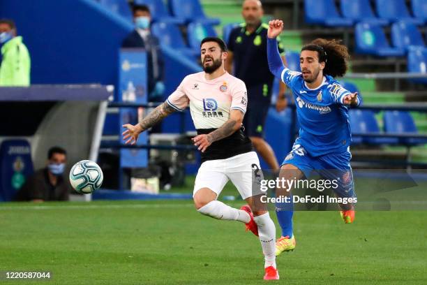 Marc Cucurella of FC Getafe and Pipa Gonzalo Avila of Espanyol Barcelona battle for the ball during the Liga match between Getafe CF and RCD Espanyol...