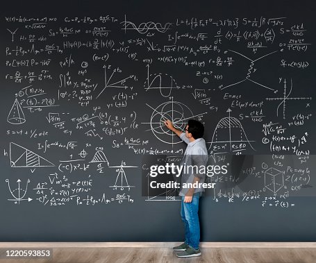 Writing Formula Math Teacher Writing Formulas On A Blackboard High-Res Stock Photo ...