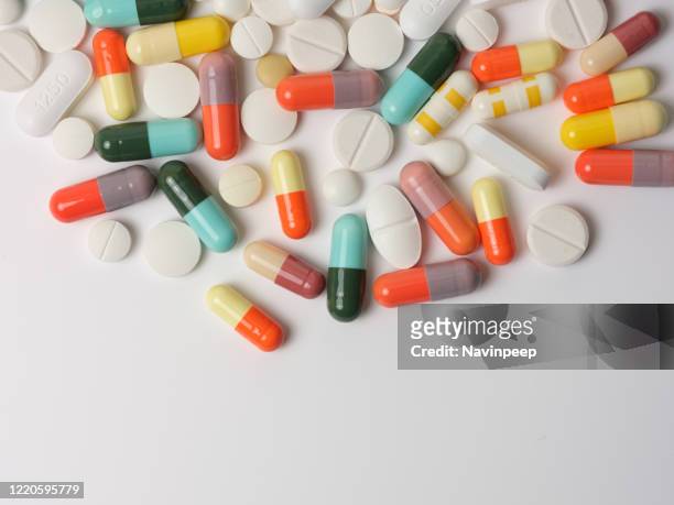 colourful pills top view - illegal drugs stock pictures, royalty-free photos & images