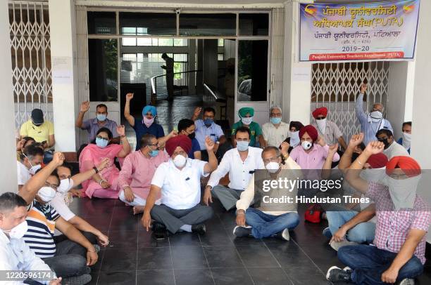 Members of Punjabi University Teachers association holding a protest against VC BS Ghuman and Punjab Government at Punjabi university campus, on June...