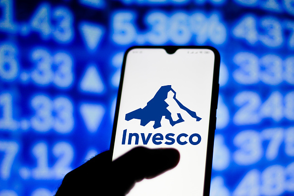 In this photo illustration the Invesco logo seen displayed...