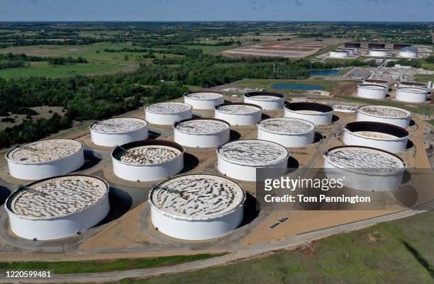 An aerial drone view of a crude oil storage facility on April 23, 2020 in Cushing, Oklahoma. Crude oil prices plummeted into negative territory this...
