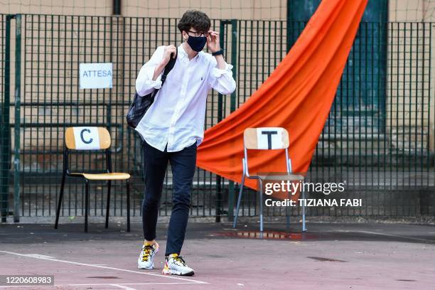 High school student is being called to pass the Baccalaureat examination on June 17, 2020 under a tent set up in the yard at the J. F. Kennedy High...