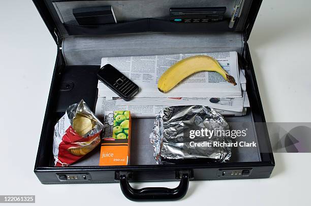 packed lunch in a brief case - miserly stock pictures, royalty-free photos & images
