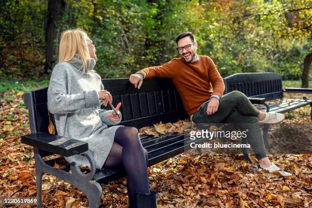 couple meeting outside - coronavirus dating stock pictures, royalty-free photos & images