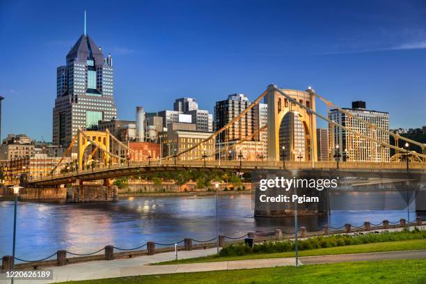 downtown skyline and the roberto clemente bridge in pittsburgh pennsylvania usa - pittsburgh stock pictures, royalty-free photos & images