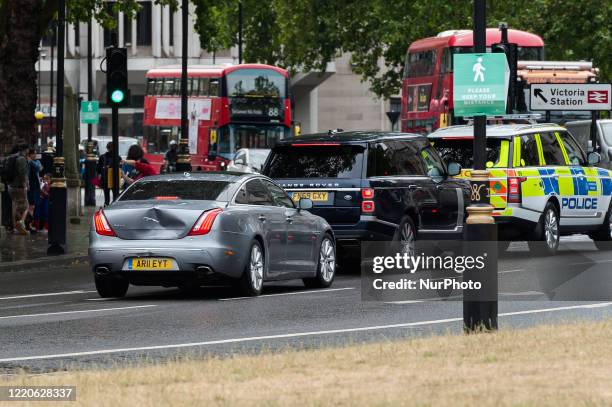 The car normally carrying Britain's Prime Minister Boris Johnson suffered a large dent in the back as a pro-Kurdish protester ran in front of the car...