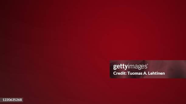 wavy and delicate lines on red background. - roter hintergrund stock-fotos und bilder