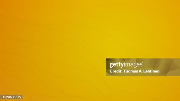 wavy and delicate lines on yellow and orange background. - yellow background stock pictures, royalty-free photos & images