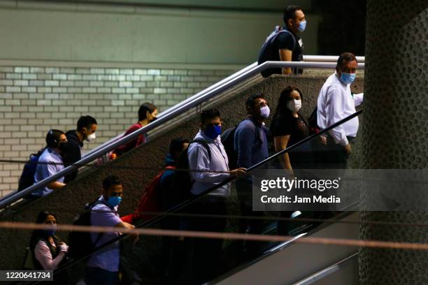 Passengers wear protective masks while taking the subway train on April 20, 2020 in Guadalajara, Mexico. Mexico started what the authorities call...