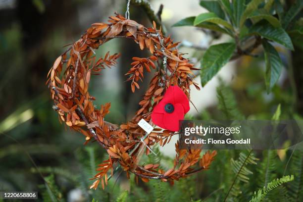 Wreath made from fallen Kauri tree leaves commemorates Anzac Day in a driveway in Titirangi on April 24, 2020 in Auckland, New Zealand. New...