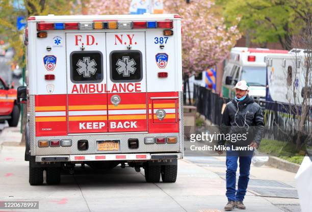 Ambulance approaches the entrance to the Brooklyn Hospital Center on April 23, 2020 in the Clinton Hill neighborhood of the Brooklyn borough of New...