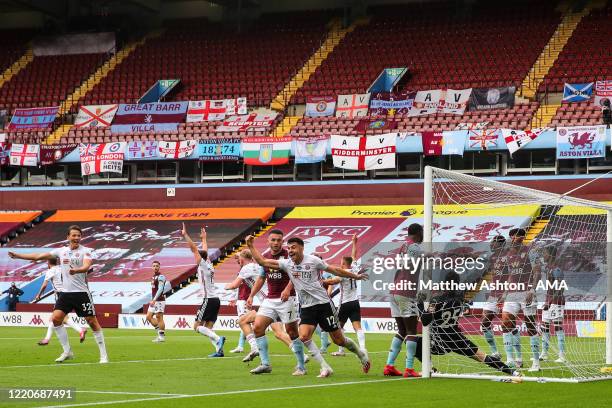 Orjan Nyland of Aston Villa pulls the ball from being the line but Referee Michael Oliver calls a no goal as the goal line technology fails during...